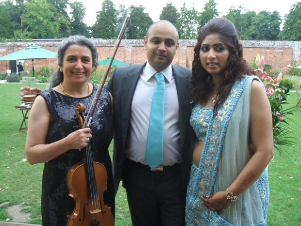 Professional Asian wedding musician with the same couple on their wedding reception. Your favourite music played on the mellow viola