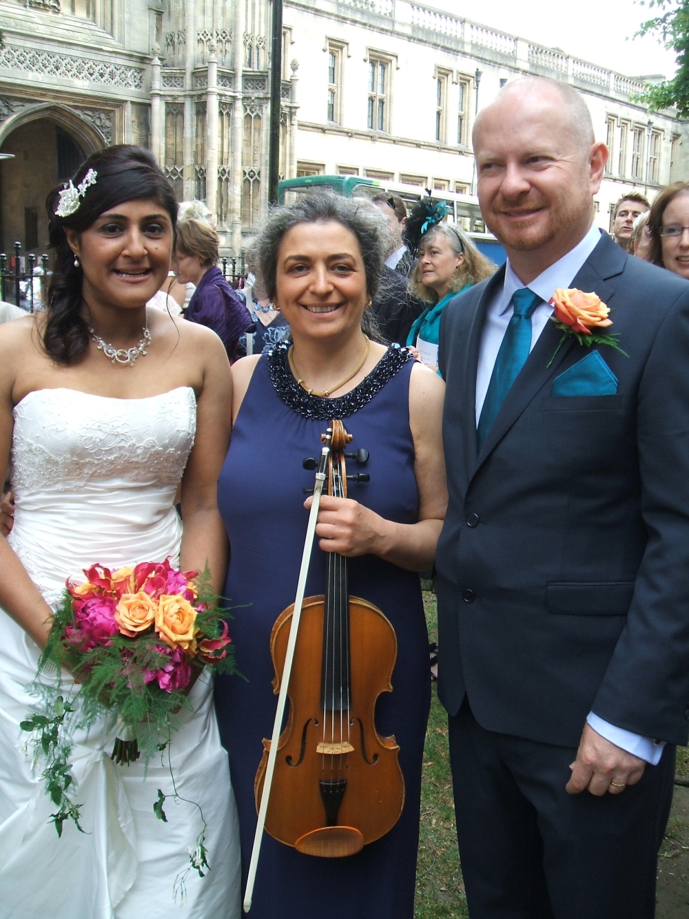 Wedding musician in Oxford with viola for another ceremony and reception. In the background is Christ Church Cathedral